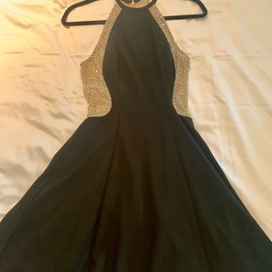 black and tan dress.  sequins.  short skirt